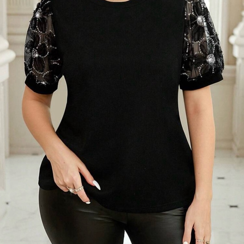 Elegant Black Top with Lace Sleeves